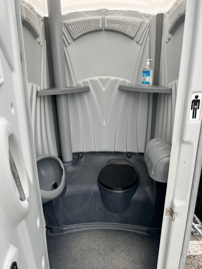 Inside our Grey Portable Toilet for Rental