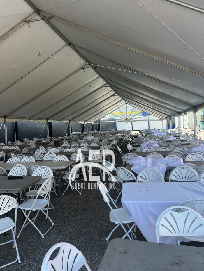 Under a 40x120 Tent Installation for a Corporate Event